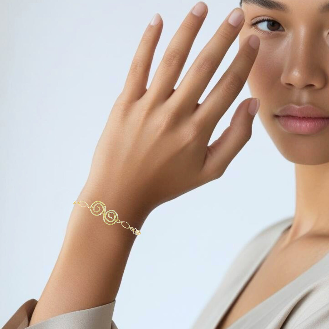 Gold Infinity Swirl Bracelet
