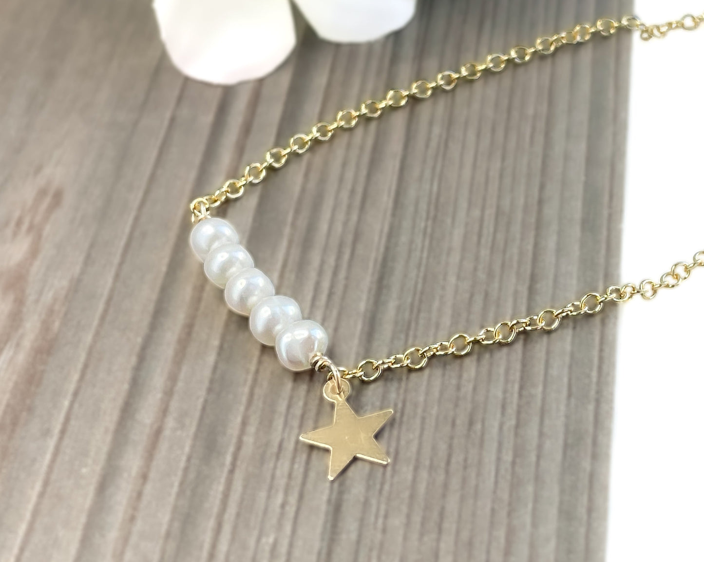 White Pearl Column with Star Charm Bracelet