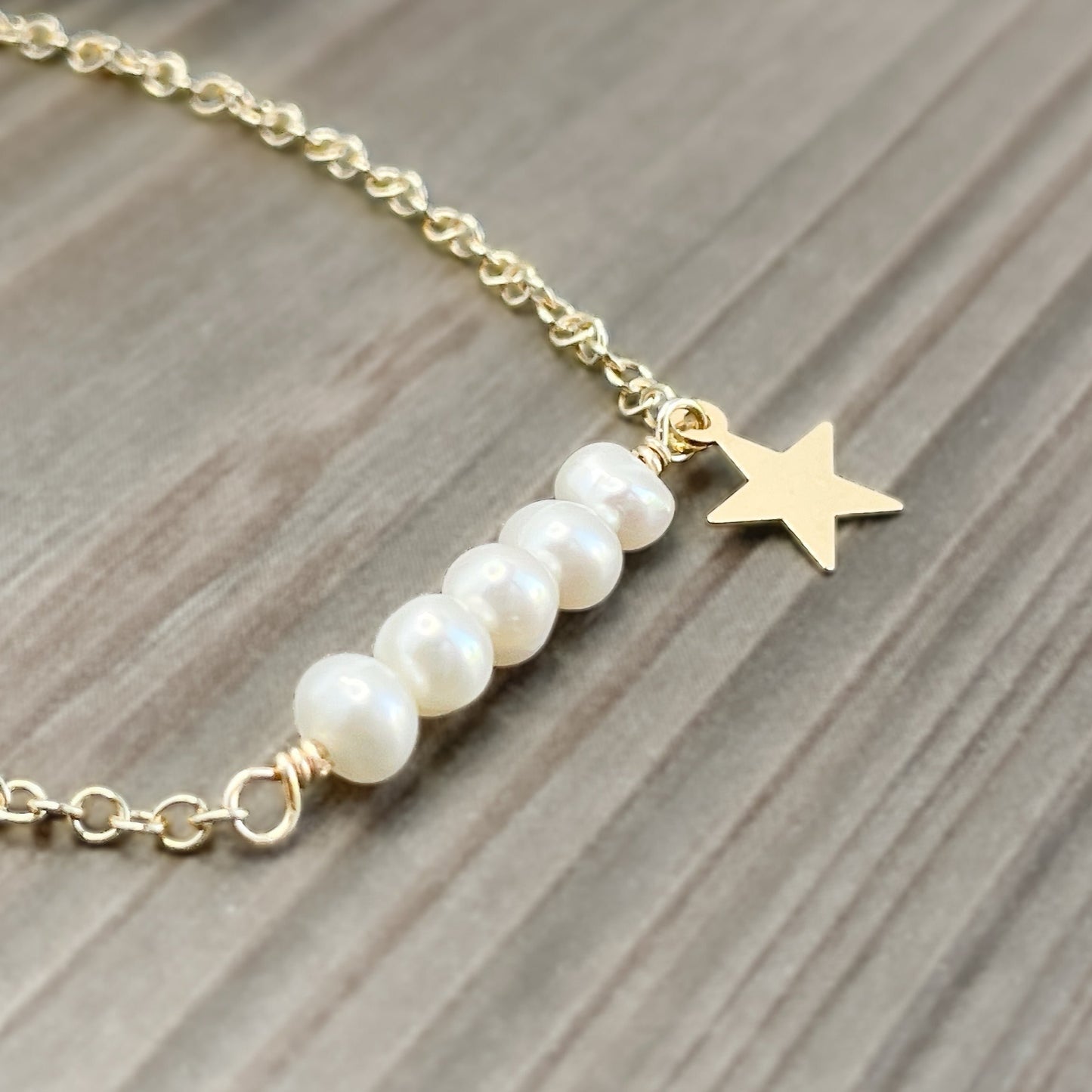 White Pearl Column with Star Charm Bracelet