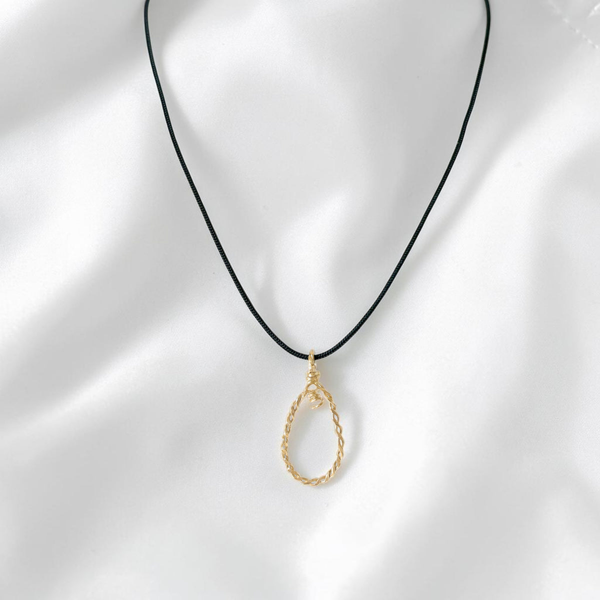 Gold Twisted Teardrop Pendant Black Cord Choker