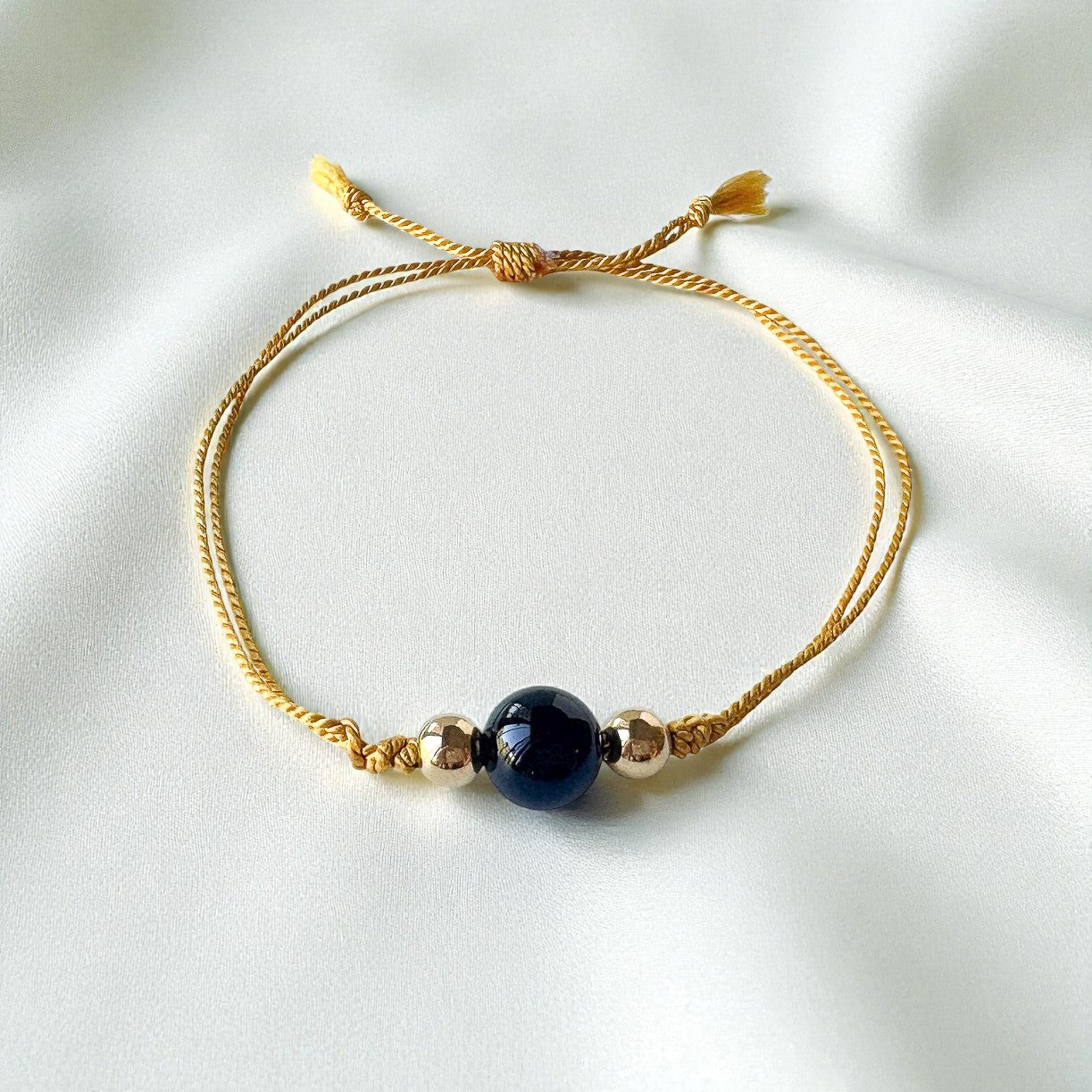 Black Onyx Bead Gold Silk Cord Adjustable Bracelet
