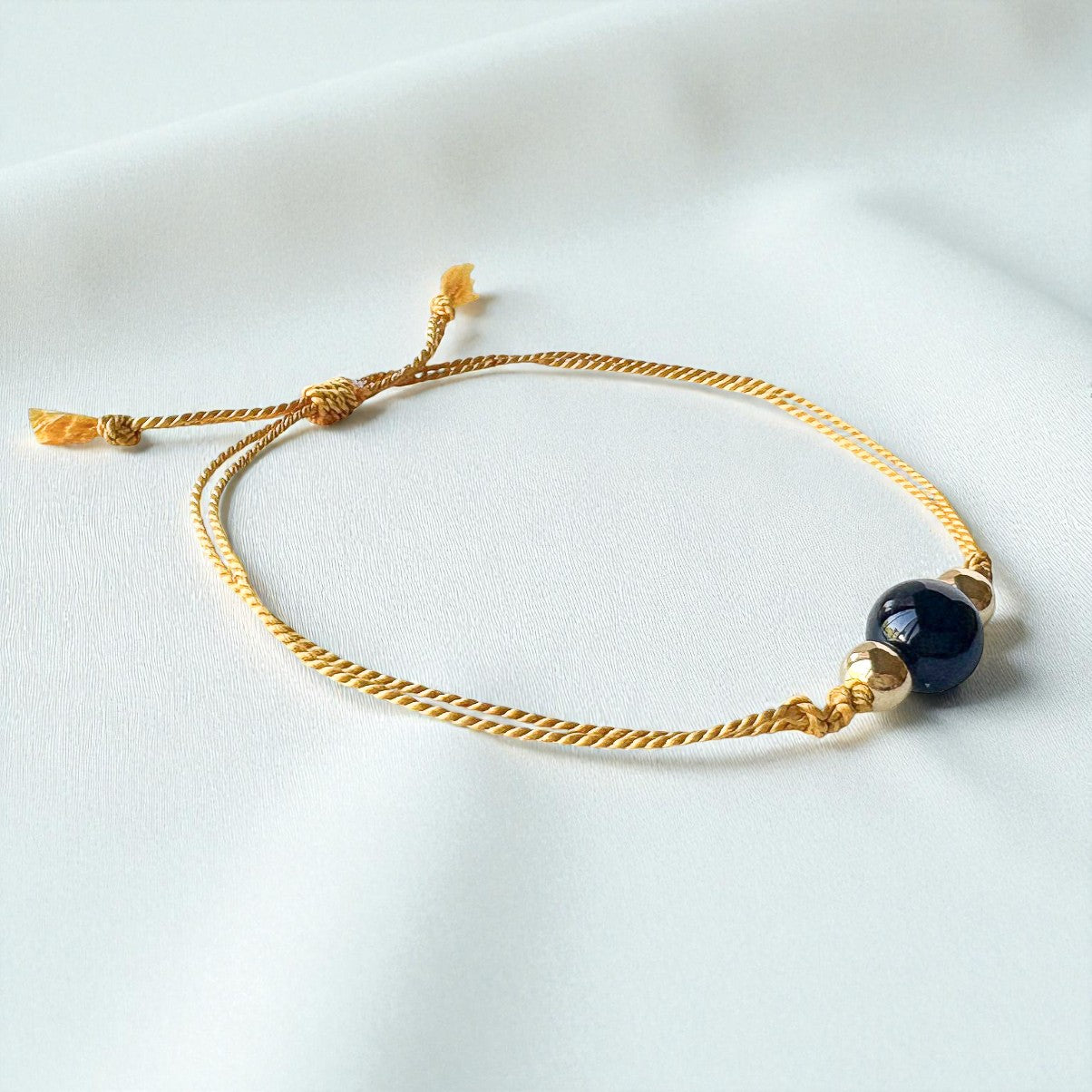 Black Onyx Bead Gold Silk Cord Adjustable Bracelet